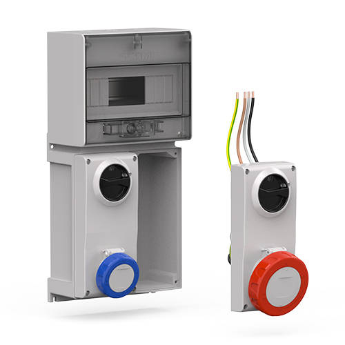 Detail of a modular system with electrical panel, industrial interlocked sockets and pre-wired cables, highlighting the speed and ease of installation thanks to the modular design and simplified wiring.